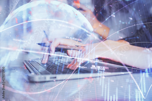 Wallpaper Mural Multi exposure of woman hands typing on computer and financial graph hologram drawing. Stock market analysis concept. Torontodigital.ca