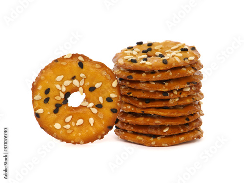 Flatten pretzel crackers with seeds isolated on white