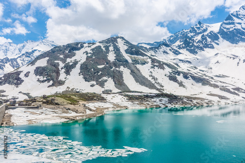 Colorful emerald lake inItalian Alps