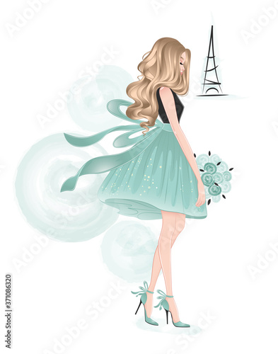 beautiful blonde lady with bouquet in mint dress