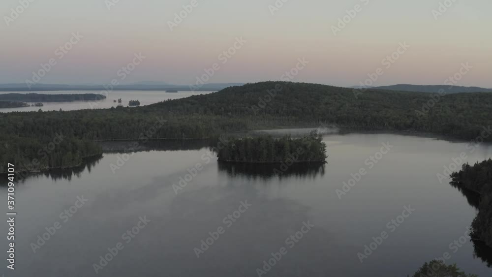 Wide aerial view over Prong Pond Summer wilderness sunrise Wide aerial view over Prong Pond Summer wilderness sunrise