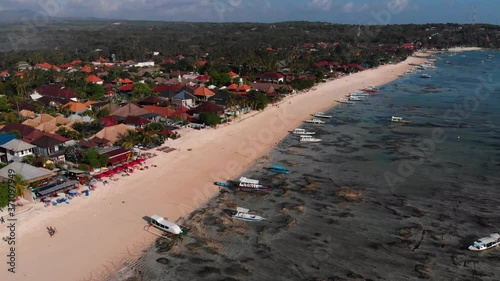 Drone shot taken in Nusa Lembongan which is an island located southeast of Bali, Indonesia. It is part of a group of three islands that make up the Nusa Penida district. photo