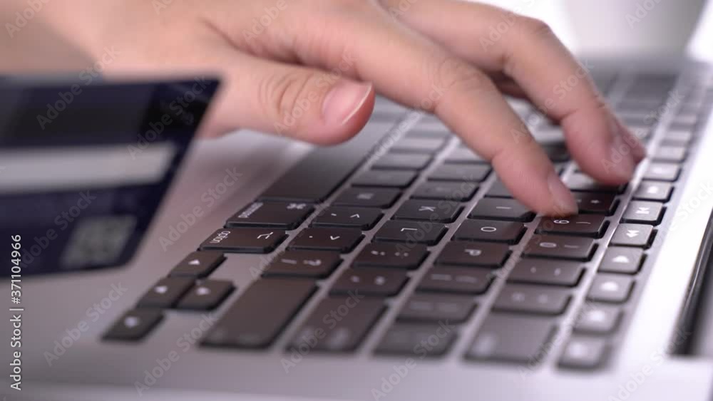 Office online paying, stay home shopping, electronic payment with credit card concept, laptop on white table background, close up. Office online paying, stay home shopping, electronic payment with credit card concept, laptop on white table background, close up.