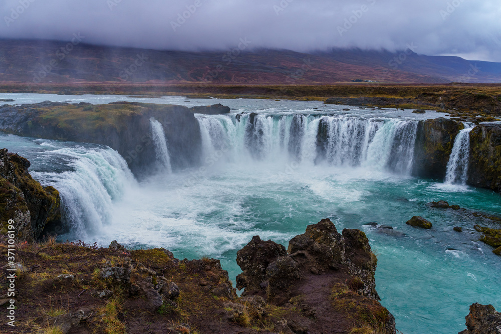 Goðafoss Waterfall on a gloomy and misty autumn afternoon Goðafoss Waterfall on a gloomy and misty autumn afternoon