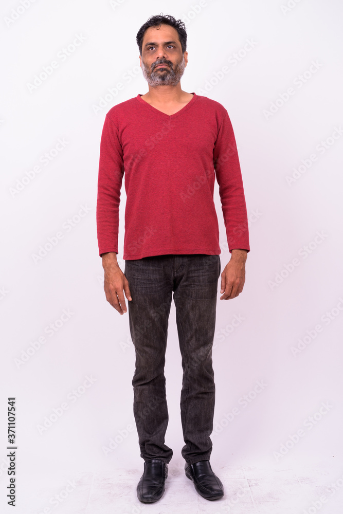 Portrait of mature handsome bearded Indian man Portrait of mature handsome bearded Indian man