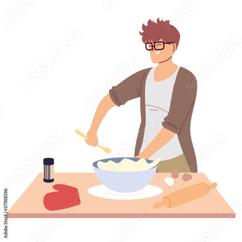 young man preparing a cake in white background