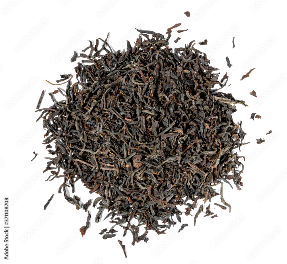 Dry black tea leaves isolated on white. Close-up top view Dry black tea leaves isolated on white. Close-up top view