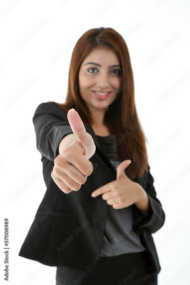 Asian young Indian woman wearing formal business office ware on white background thumbs up sign Asian young Indian woman wearing formal business office ware on white background thumbs up sign