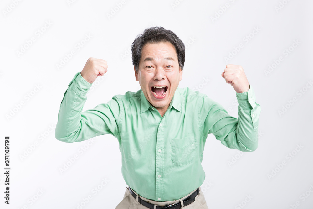 ガッツポーズをする男性 ガッツポーズをする男性