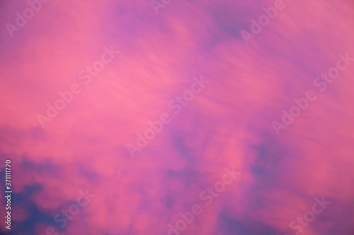 Blurred pink clouds in the sky, abstract background