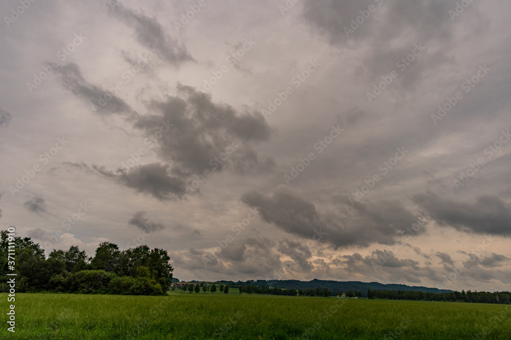 Thunderstorm clouds in the Wilhelmsdorfer Ried in Upper Swabia Thunderstorm clouds in the Wilhelmsdorfer Ried in Upper Swabia