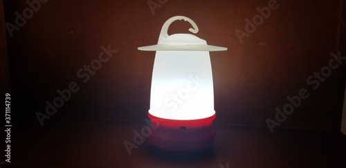 white candle on a dark background
