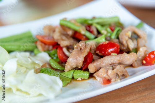  Stir-fried pork with shrimp paste in white plate