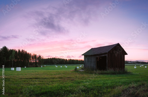 An old abandoned barn in sunset. This shot was taken at Rusko, Finland in August 2017. © Finmiki