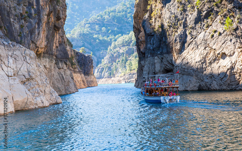 Rocky island with Green canyon in a mountain lake - Oymapınar Dam and Hydroelectric Power Plant, Manavgat / Antalya