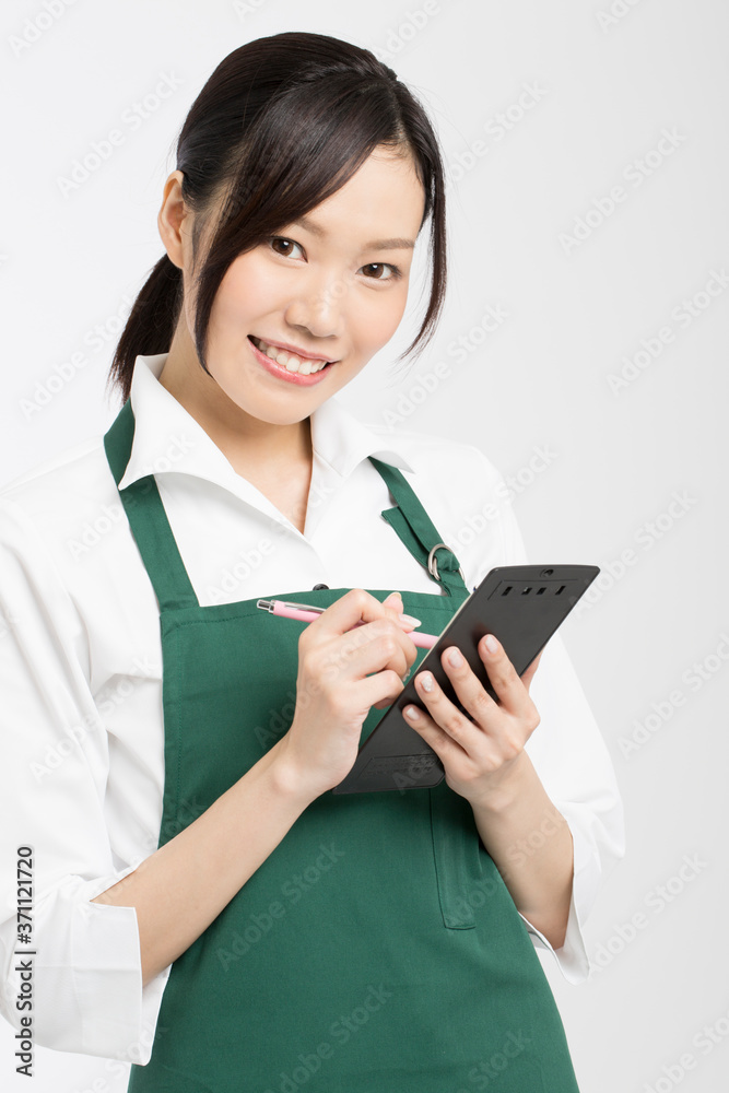 注文を聞く女性店員