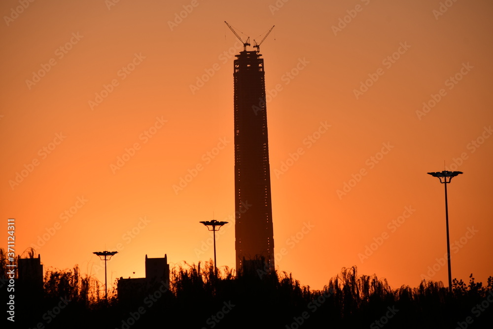 Silhouette of the highest skyscraper in Tianjin, China in sunset light