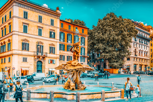 ROME, ITALY- MAY 10, 2017:  Beautiful landscape  urban and historical view of the Rome, street, people, tourists on it. The Triton Fountain (Fontana del Tritone). Italy.