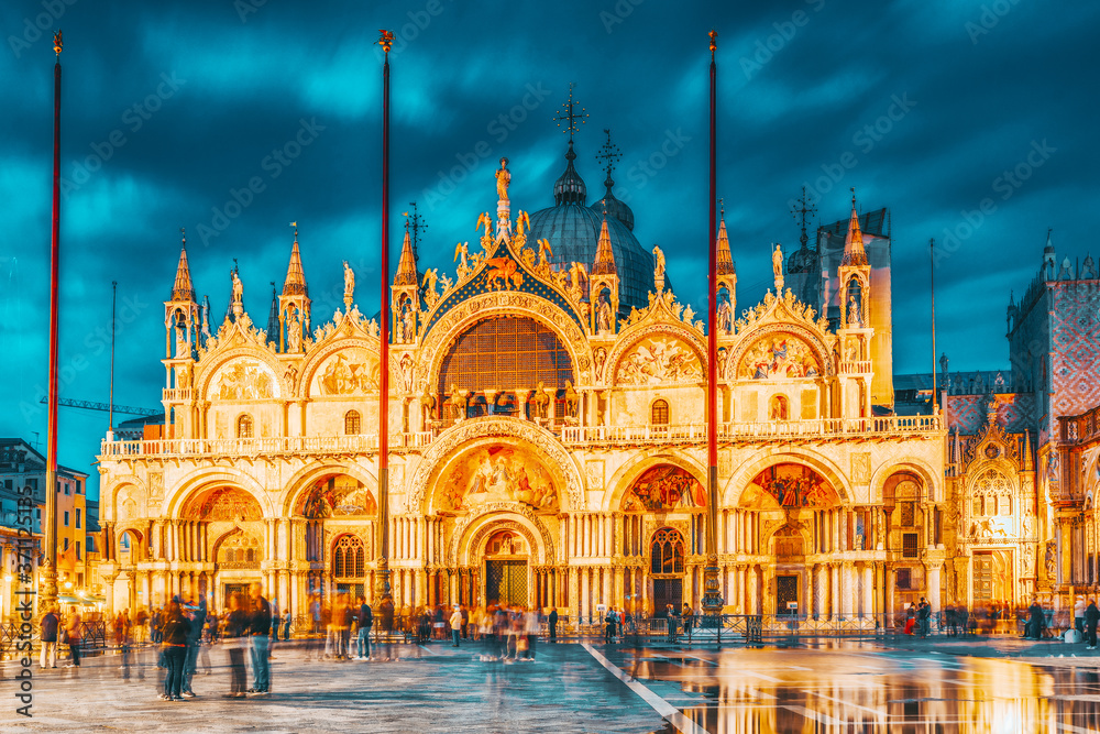 Square of the Holy Mark (Piazza San Marco) and St. Mark's Cathedral (Basilica di San Marco) at the night time. Venice, Italy.