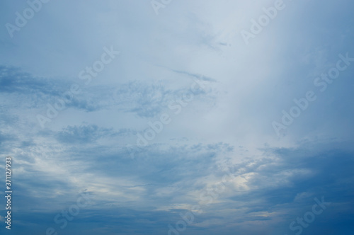 Beautiful sunset sky with clouds, Summer background © grapestock