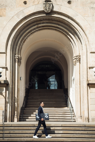 Fashion man with Dj console walking on stairs © Роман Котиков