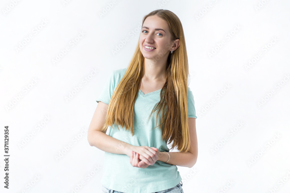 Portrait of a happy woman standing with arms folded isolated on a white background Portrait of a happy woman standing with arms folded isolated on a white background