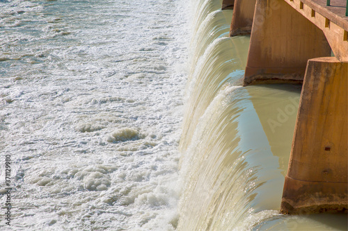 Water spills over the top of Silifke Dam on the Goksu River © muratart