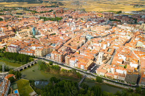 Aerial view of Palencia cityscape on Carrion river with Catholic Cathedral in summer day, Spain..