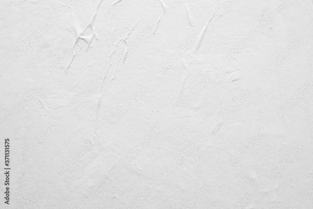 Obraz premium Blank white crumpled and creased paper poster texture background