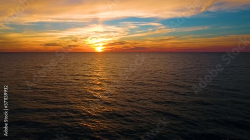 Beautiful sunrise and sunset on the lake and the sea