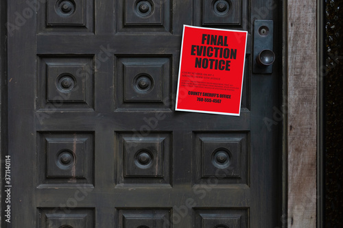 Eviction notice on front door of house