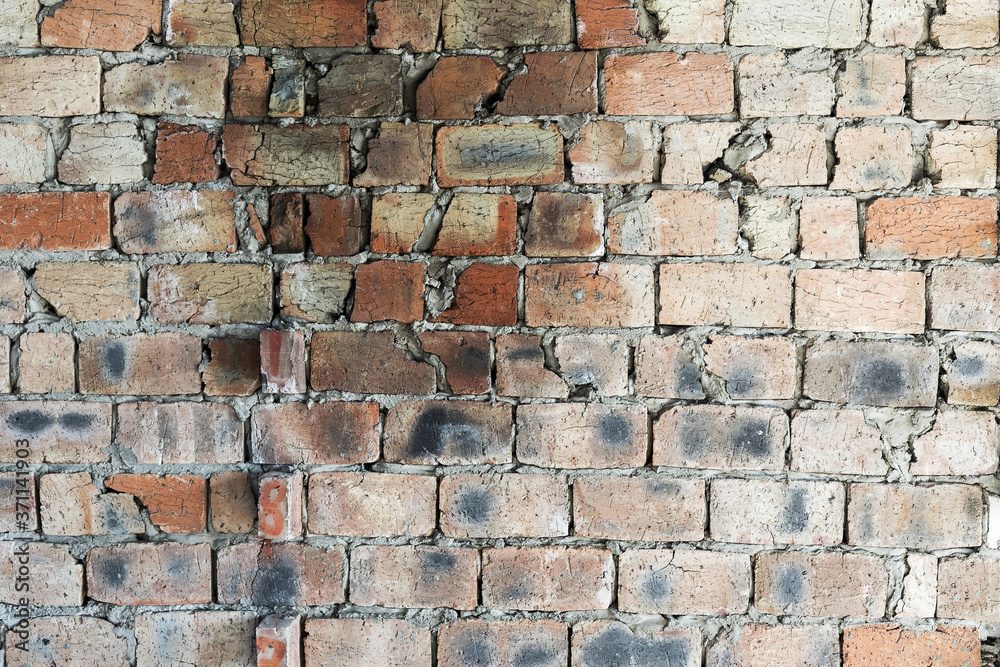 Abstract background old white brick wall with cracks and scratches. Landscape style. Great background or texture.