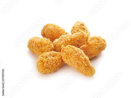Fried crispy chicken legs on white background