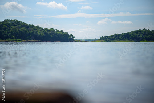 Landscape image of a lake with background It's mountains and sky