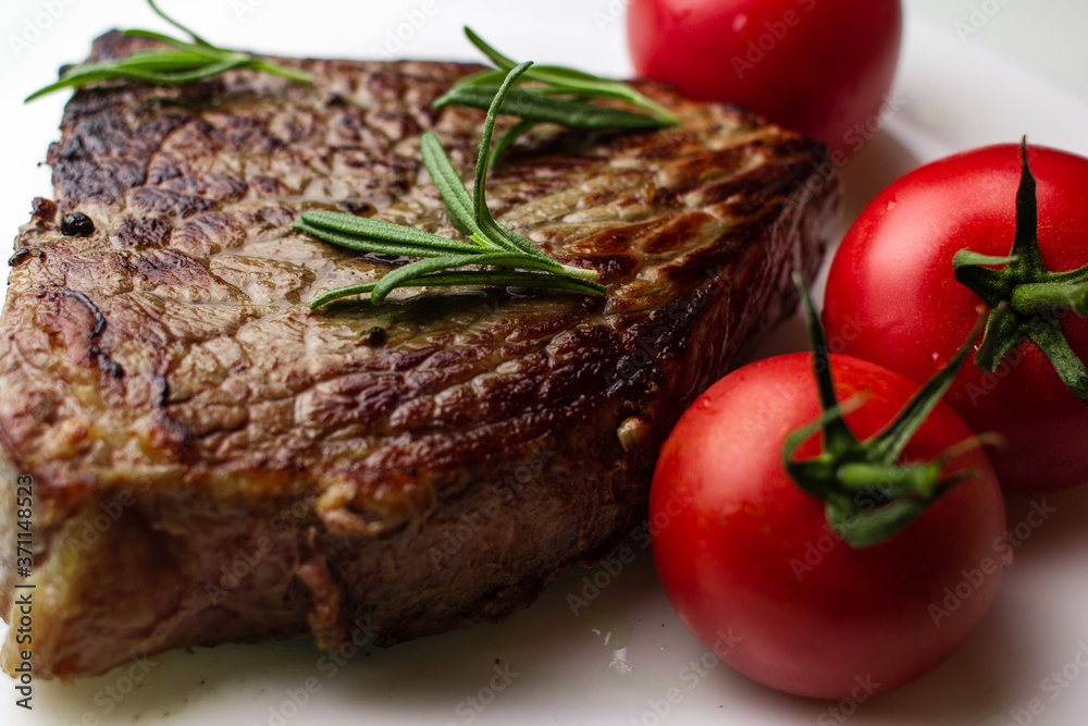 grilled steak with vegetables close up