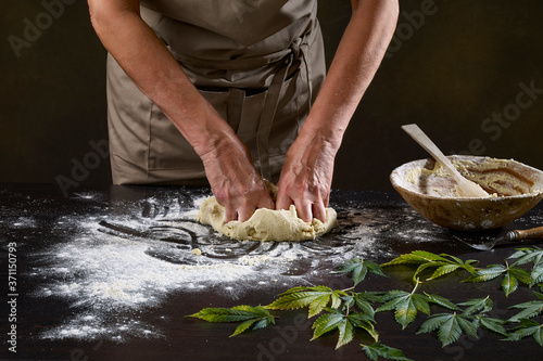 Kneading the marijuana dough photo