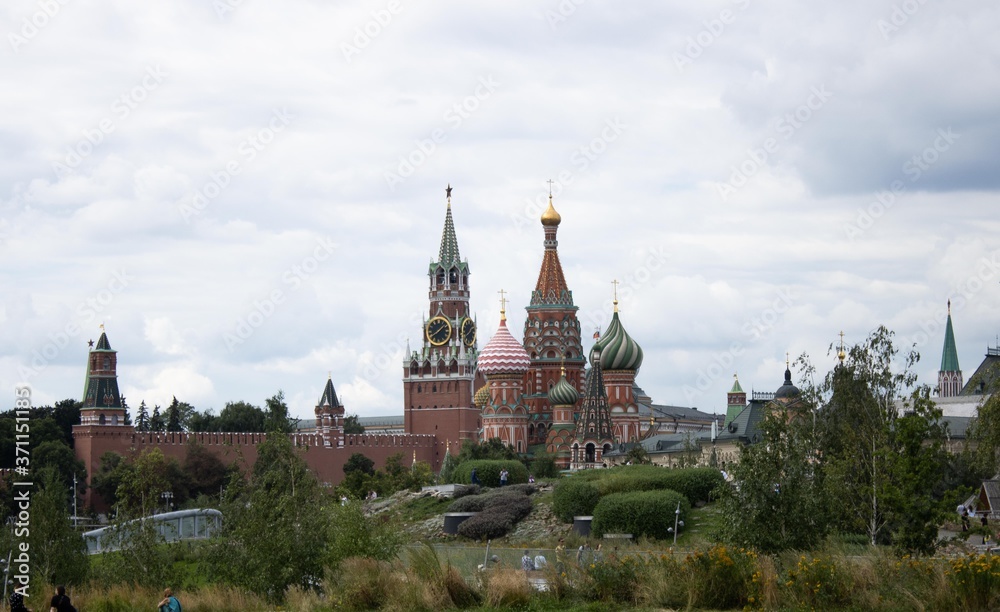 Moscow, Russia, , 08.2020. View for St. Basil's Cathedral and the Spasskaya tower of Kremlin from Zaryadye Park.