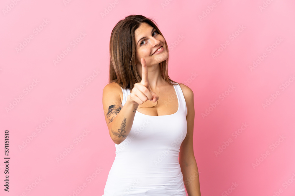 Young slovak woman isolated on pink background showing and lifting a finger Young slovak woman isolated on pink background showing and lifting a finger