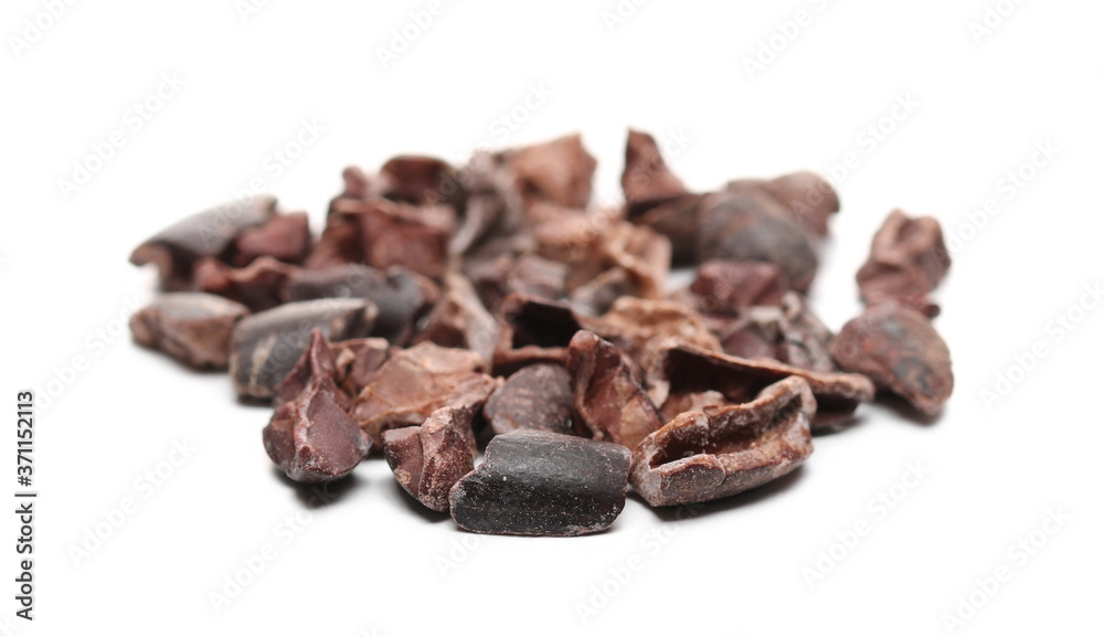 Chopped up cocoa pieces pile, isolated on white background, closeup Chopped up cocoa pieces pile, isolated on white background, closeup