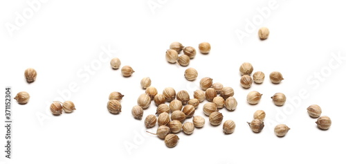 Coriander seeds pile isolated on white background