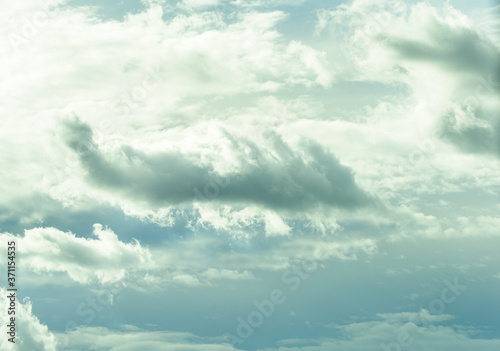 Beautiful heavenly clouds with pastel blue skies.