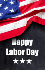 Happy Labor Day text and USA flag on black color background