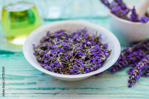Lavender flowers and ingredients for aromatic lavender oil.