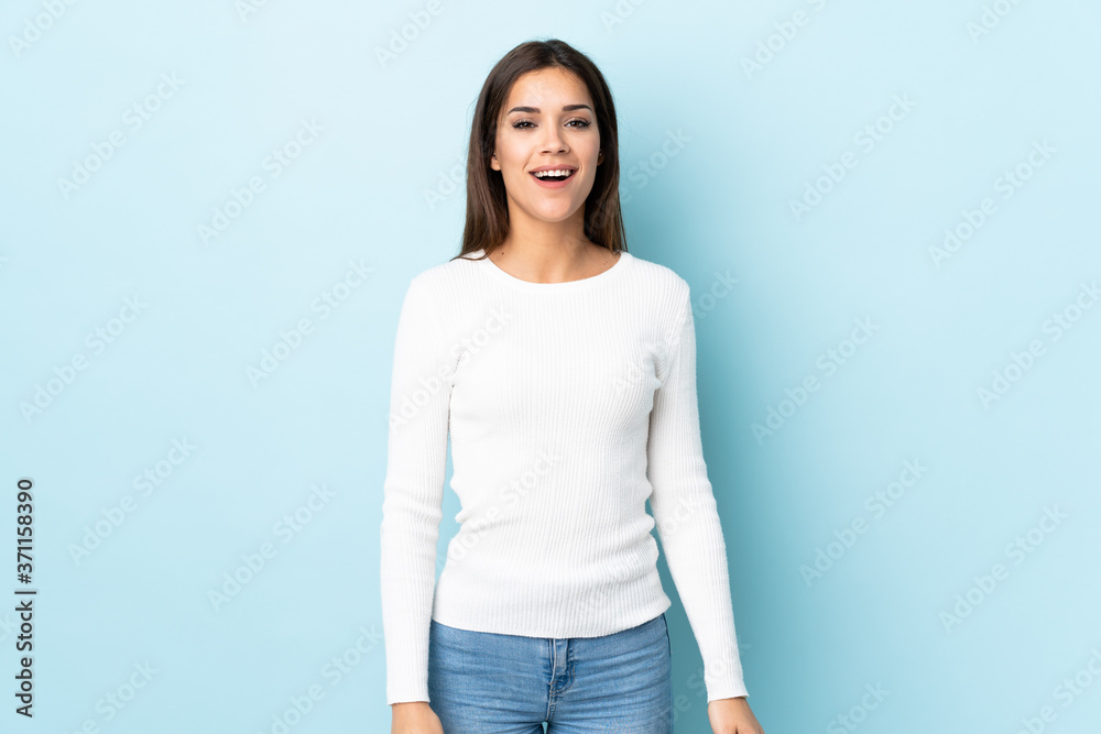 Young caucasian woman isolated on blue background with surprise facial expression Young caucasian woman isolated on blue background with surprise facial expression