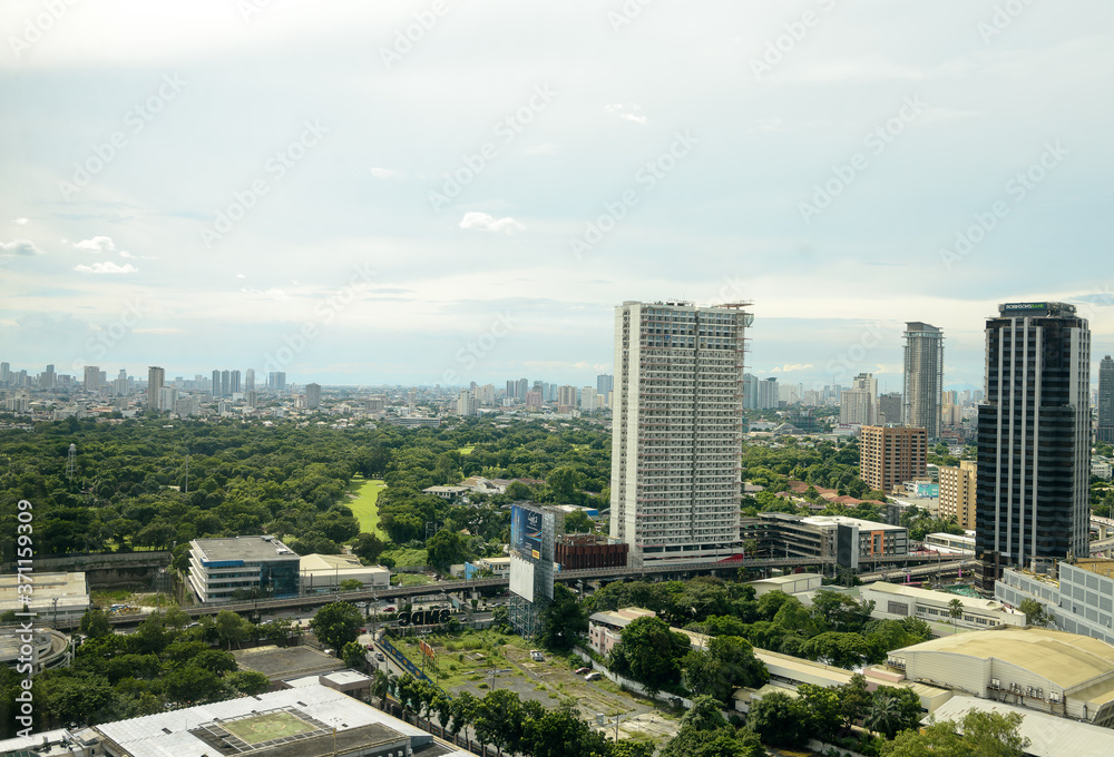 Manila, Philippines - August 12 2020: Manila skyline cityscape shot wide angle. 
