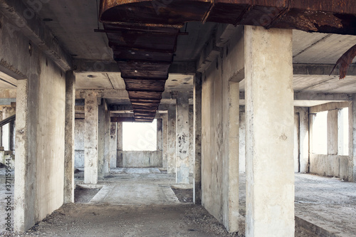 Ruins of unfinished construction of multi-storey residential building © Elena