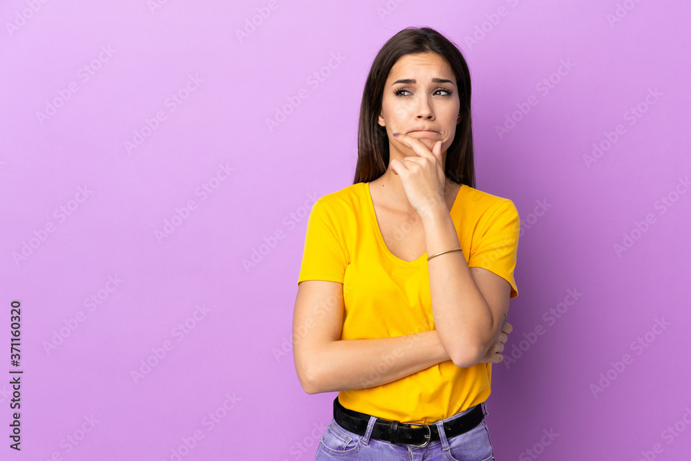 Young caucasian woman over isolated background having doubts and thinking Young caucasian woman over isolated background having doubts and thinking