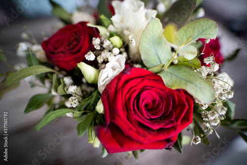 A bouquet of red and white roses for an anniversary