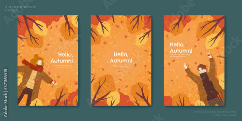 Couple lying on autumn forest floor