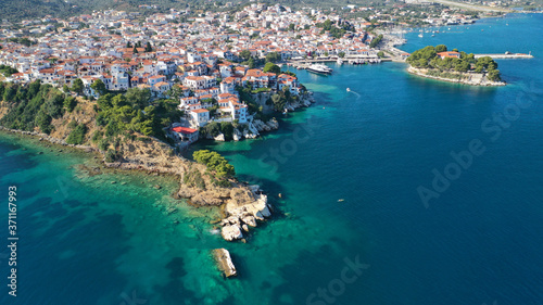 Aerial drone photo of picturesque small beach of Plakes in main village of Skiathos island, Sporades, Greece © aerial-drone